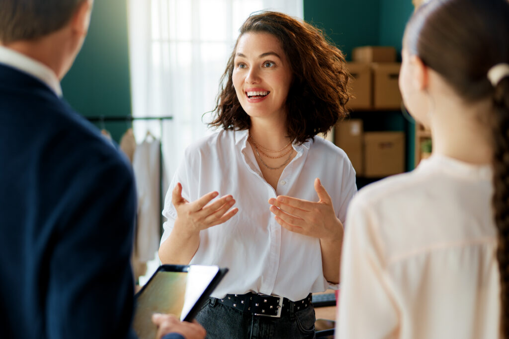 Sales rep talking to customers